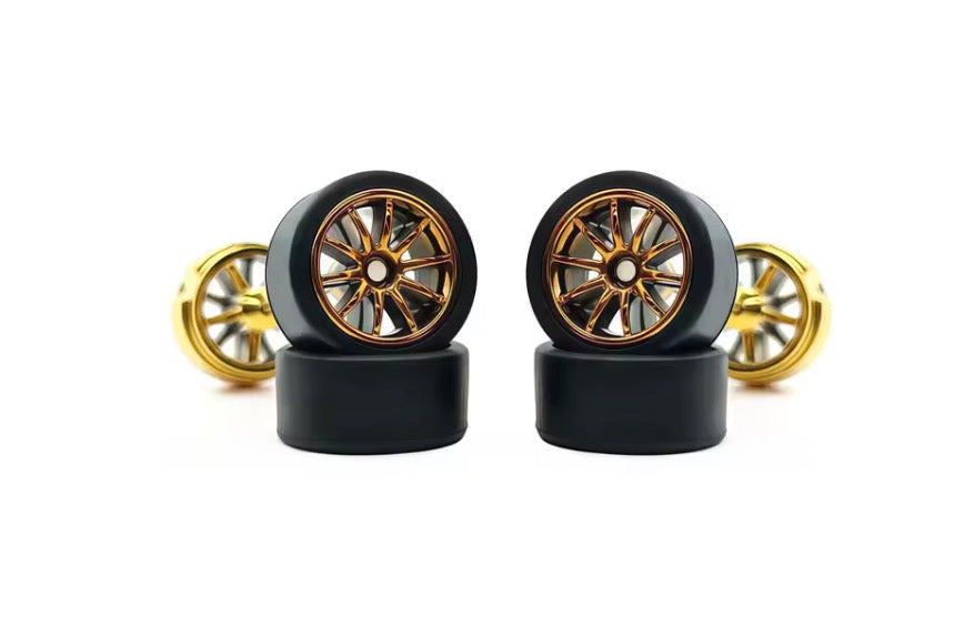 Gold spoked wheel set with blackwall tires