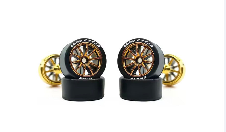 Gold spoked wheel set with white letter tires