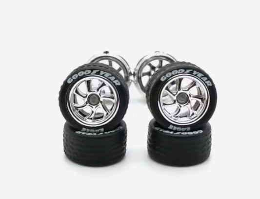 Chrome twisted 7 spoke wheel set with white letter tires